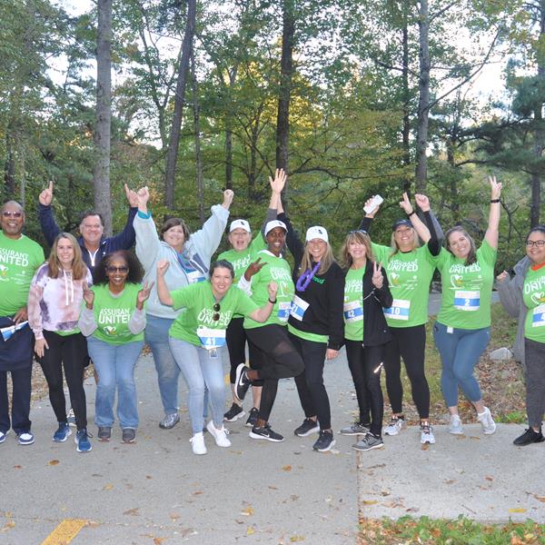 Assurant employees celebrating end of 5K event in Atlanta