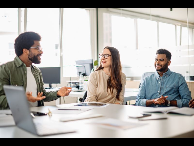 A spirited discussion among a diverse professional team