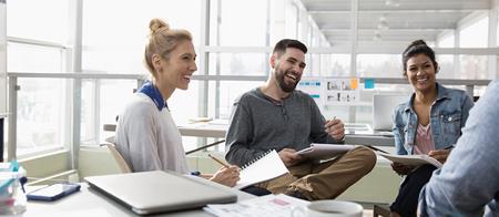 BUSINESS TEAM Meeting Laughing Getty 705003595 LR