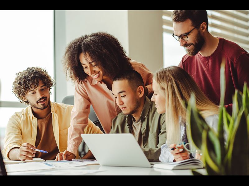 Group of college students working together