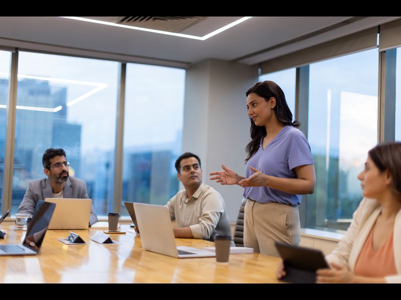 Professionals Having A Meeting In Conference Room