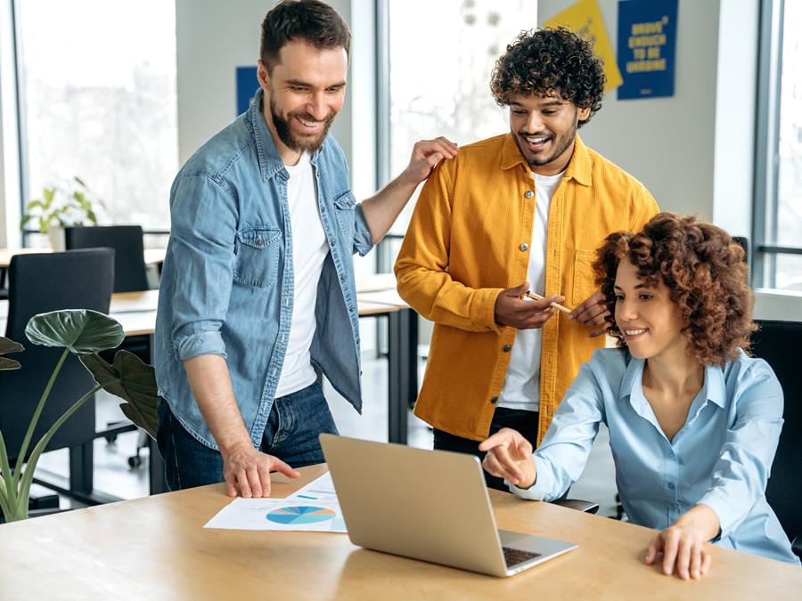 Team Working Together In A Hybrid Office