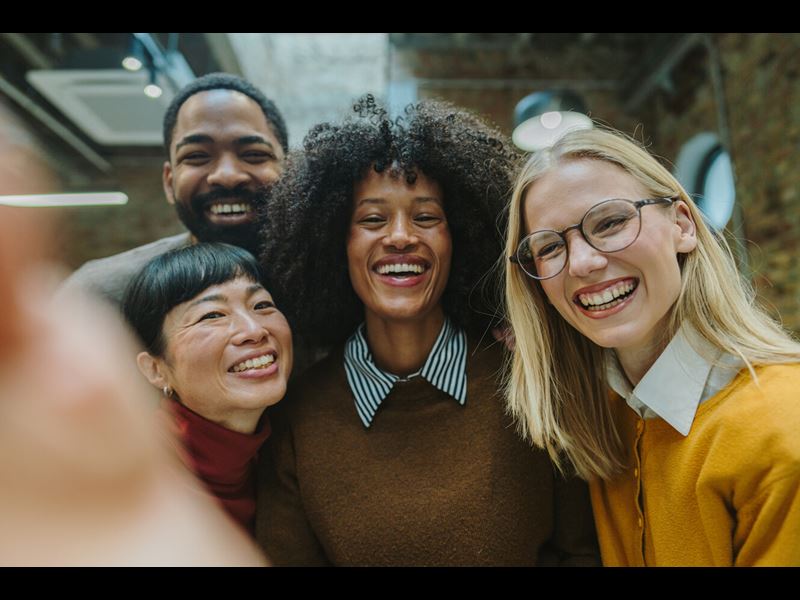 Diverse Group Of Professionals Smiling
